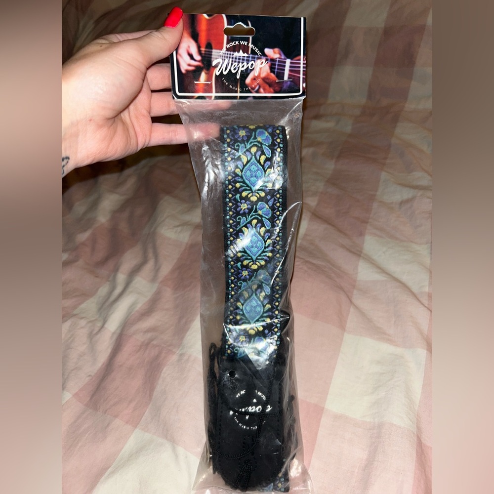 New in packaging wepop guitar strap